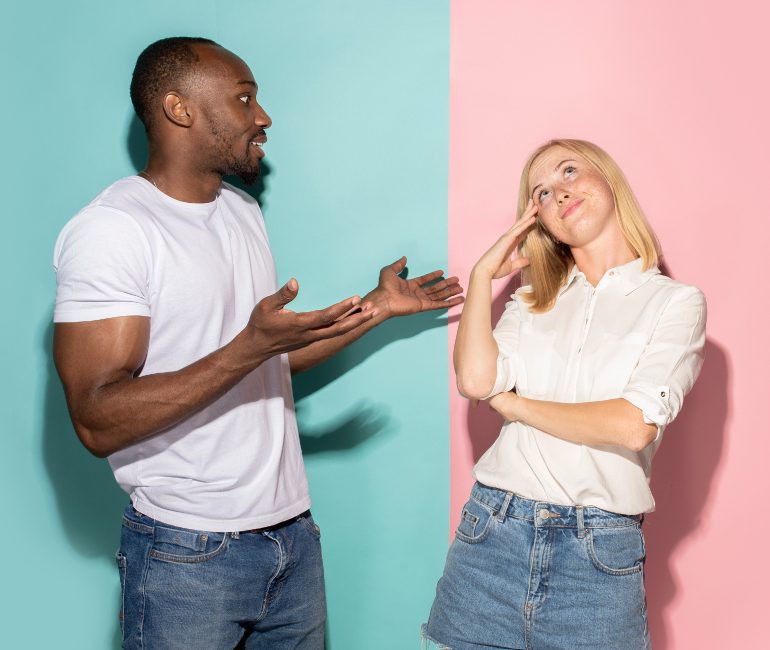 Man and woman in playful discussion